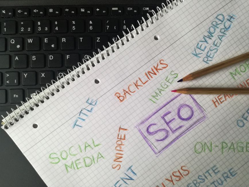founder planning SEO content strategy on whiteboard with growth metrics, modern startup office stock photo
